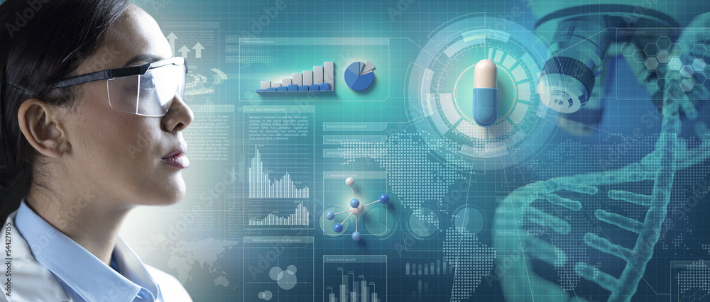 Wall mural chemical analyst looking at medical capsule in a scientific background with charts, diagrams and dat