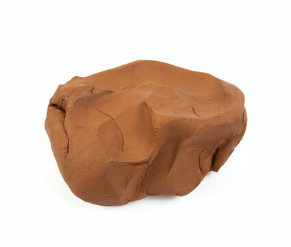 Natural clay piece isolated on white background. Wet clay material for sculpting or modeling.