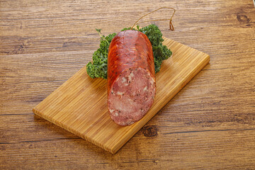 Pork ham sausage over board