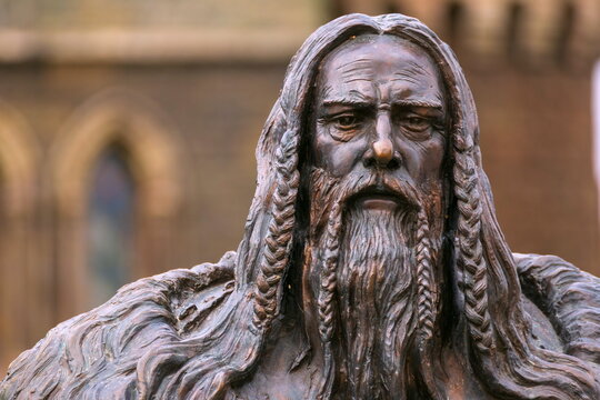 Russia, Samara region, September 2021: sculptures of a Scandinavian warrior in armor holding a battle ax in his hand. The village of Khryashchevka.