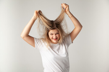 Fototapeta premium woman screaming, girl tearing her hair