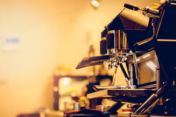 Coffee machine in a coffee shop, vintage tones for background.