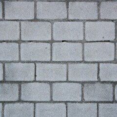 Old grey concrete block brick wall grunge background texture