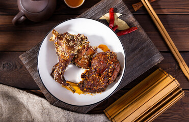 The traditional dish is spicy rabbit steak rabbit leg