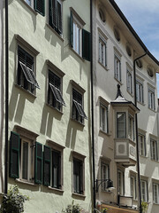 Old historic architecture in Italy. Traditional European old town buildings. Aesthetic summer travel concept. Sunlight shadows