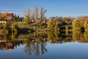 Autumn landscape with a pond.