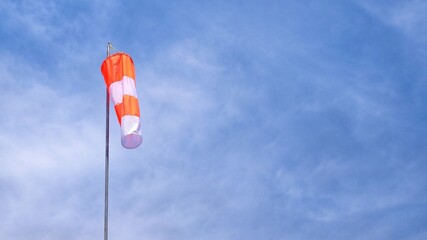 Wind Speed and Wind Gust for Weather Safety During Construction and Operations against blue sky...
