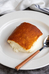 Kazandibi dessert on a dark background. Milky dessert. Traditional Turkish cuisine delicacies. close up