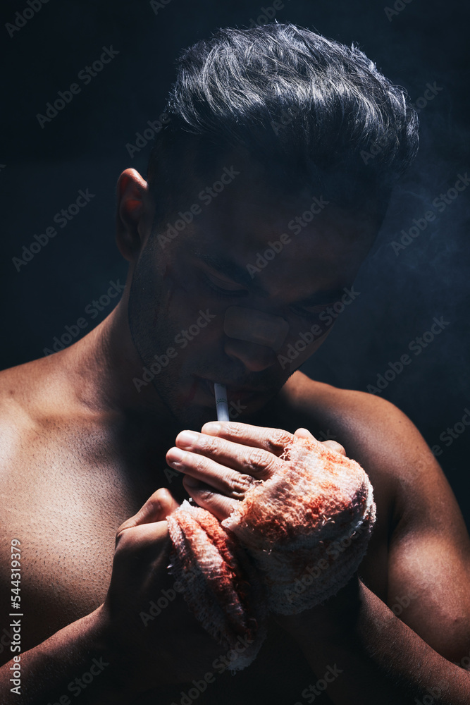 Sticker Boxer man, fight and blood of a boxing fighter with cigarette after training accident and a injury. Smoking fitness, workout exercise and wellness athlete smoke with a hand bandage from sport