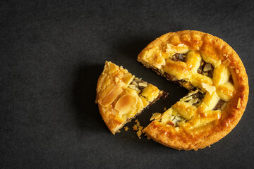 one sliced christmas mince pie closeup