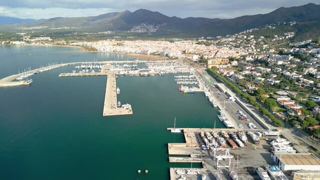 Aerial images of the city of Roses on the Costa Brava in Girona Mediterranean beach region of Alto Ampurdán  fishing port