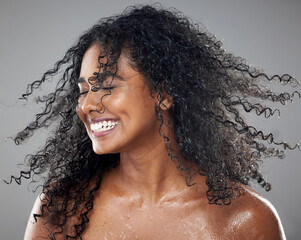 Beauty, wet and woman with a hair care and skincare treatment for wellness in the studio. Health,...