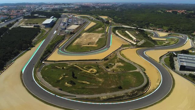 Aerial view overlooking the Autodromo Fernanda Pires da Silva, in Estoril, Lisbon, Portugal - pull back, drone shot