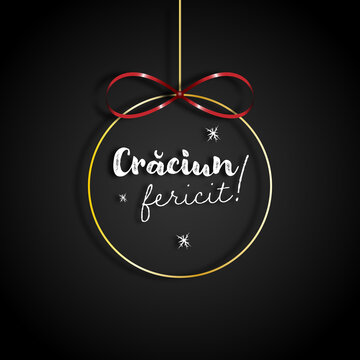 Background with golden toy for the Christmas tree. Merry Christmas in romanian-Crăciun fericit in limba romana. 