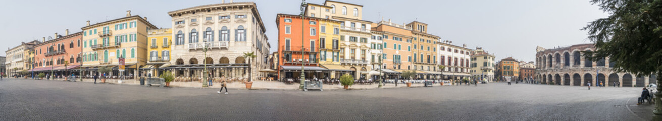 Fototapeta na wymiar Extra wide view of The beautiful Square Brà in Verona with houses with colored facades