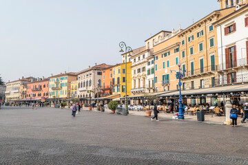 The beautiful Square Brà in Verona with houses with colored facades