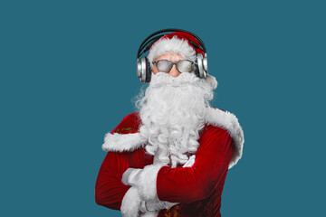Cool Santa Claus is listening music in headphones. Cool DJ Poster - Your text.