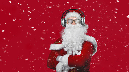 Cool Santa Claus is listening music in headphones. Cool RED DJ Poster - Your text.
