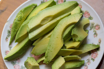 Green ripe sliced palta avocado guacamole raw fresh vegetable food