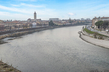 Fototapeta premium The Adige river and the panorama of Verona seen from the Castelvecchio bridge