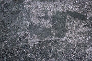 closeup texture of rough dark grey urban concrete surface