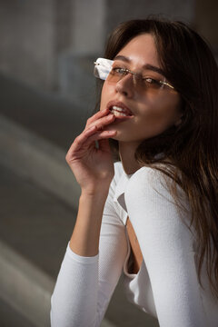 Photo of cheerful glad nice woman wear white blause and sunglass