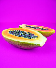 half and fresh papaya