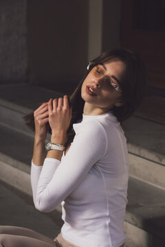 Photo of cheerful glad nice woman wear white blause and sunglass