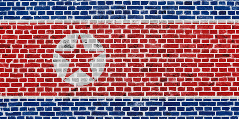 Flag of North Korea painted on a brick wall