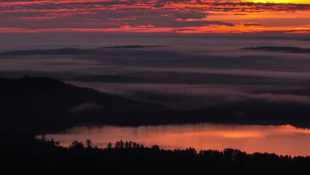 Golden hour spectacularly illuminates Lake at Monson