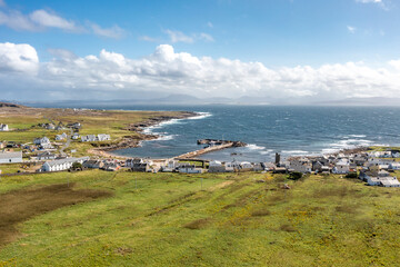 Aerial view of the settlement An Baile Thiar or West Town on Tory Island and harbour, County Donegal, Republic of Ireland © Lukassek