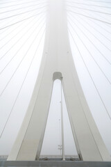 Fototapeta na wymiar The bridge was shrouded in fog