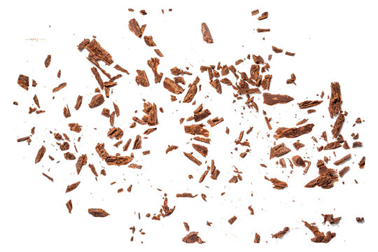 Cracked broken chocolate isolated on white background. Dark bitter  Chocolate chips pieces Top view. Flat lay..