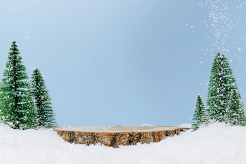 Winter podium, wooden display with fir tree and falling snow. Festive showcase, winter and holidays...