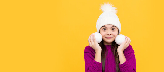 Winter child isolated portrait. happy cute teen girl wear hat hold decorative balls, new year. Banner of christmas child girl, studio kid winter portrait with copy space.