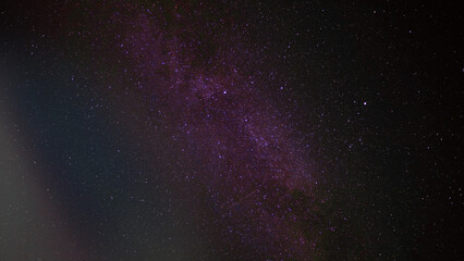Milky Way and silhouette of tree at Phu Hin Rong Kla National Park,Phitsanulok Thailand, Long exposure photograph.with grain 