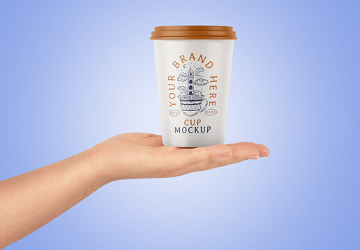 Cup in Woman's Hand Mockup