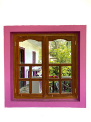 Window with beautiful shutters in the guesthouse