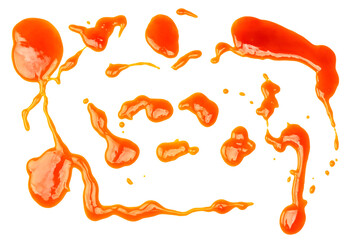 Orange sauce splashes isolated on white background. Top view.