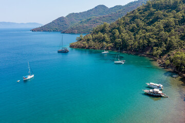 Turquoise sea and aerial view of boats at Ekincik bay. 