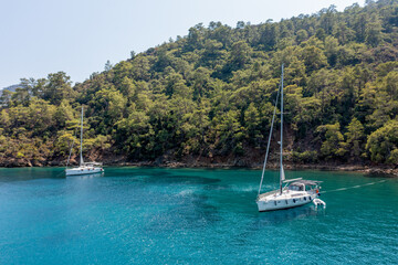 Turquoise sea and aerial view of boats at Ekincik bay. 
