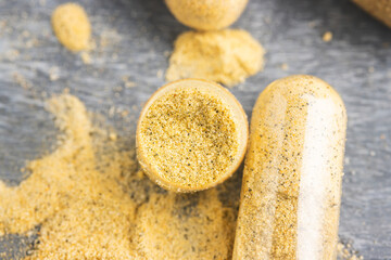 Mix of herbal supplement capsules and vitamin pills