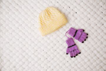 knitted hat and small gloves