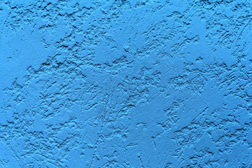 Crépi bleu sur façade de maison 