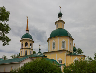Fototapeta na wymiar View of the Transfiguration Church in Irkutsk on cloudy spring morning.