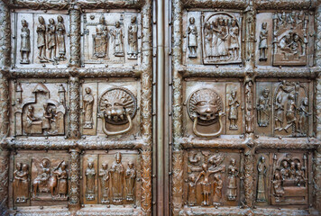  Magdeburg Gate is a Romanesque bronze gate of the middle of the XII century on the western side of St. Sophia Cathedral in Veliky Novgorod