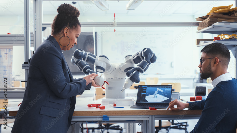 Poster Chief Engineer and Young Computer Science Specialist with Laptop Analyse and Discuss How Futuristic Robotic Arm Works. Promising and Smart Engineering Majors Collaboration Concept.
