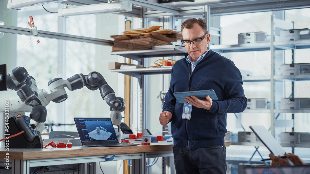 Poster In Robotics Development Laboratory: Future Engineers and Scientists Work on Automated Robotic Arm Prototype. Professional Tech Entrepreneur Inspires People For New Technological Achievements.