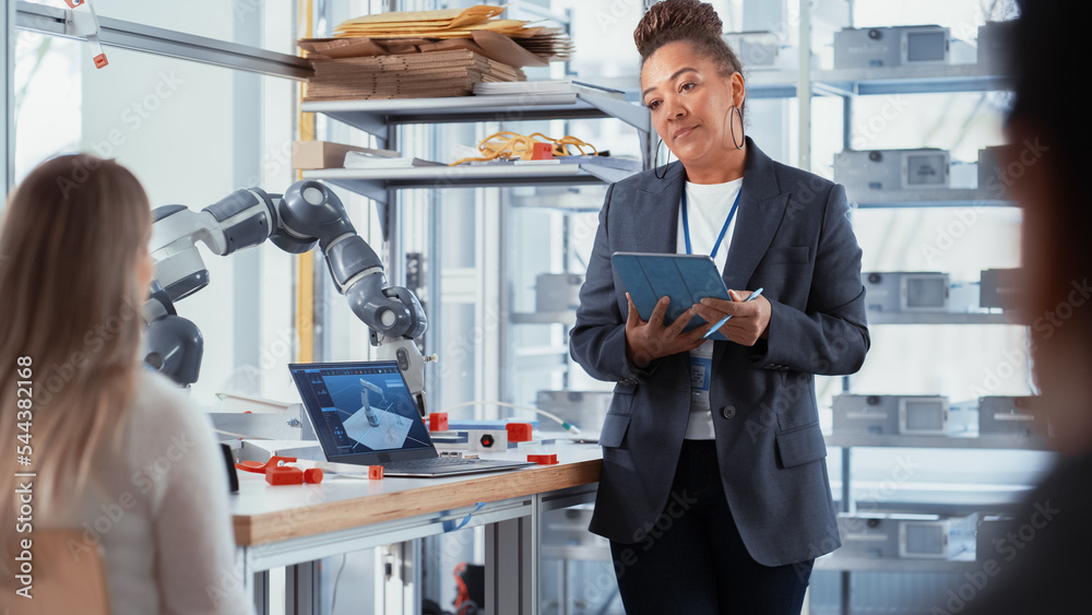 Poster Intelligent Future Engineer Listening Carefully to Lecturer. Black Scientist Explains About Building Machines that Can Replicate Human Actions. Robotics Technology for Different Industries.