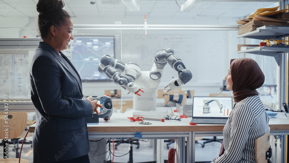 Poster Black Senior Engineer Manipulating Robot Arm with Controller. Explain Main Principles to Intelligent Middle Eastern Developer. Computer Science Education. Building, Designing, Learning Concept.